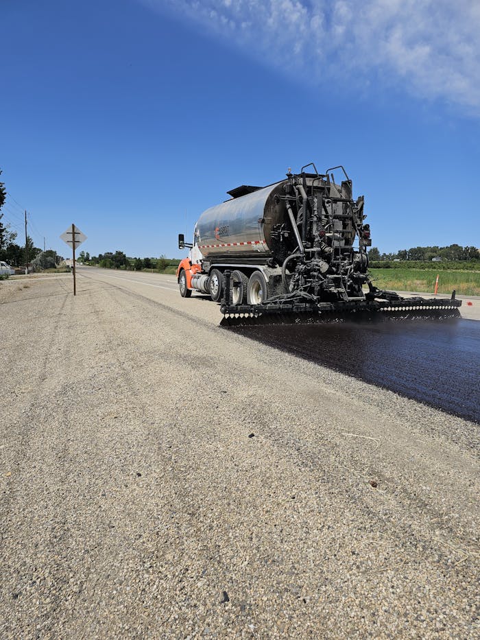 Tarmac road construction on a sunny day in Marsing, Idaho.